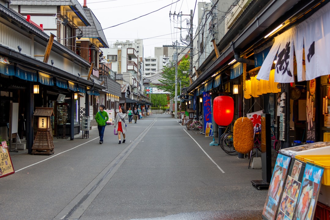 A couple stands outside the Kabukiza theatre in Ginza after attending a Kabuki program in June