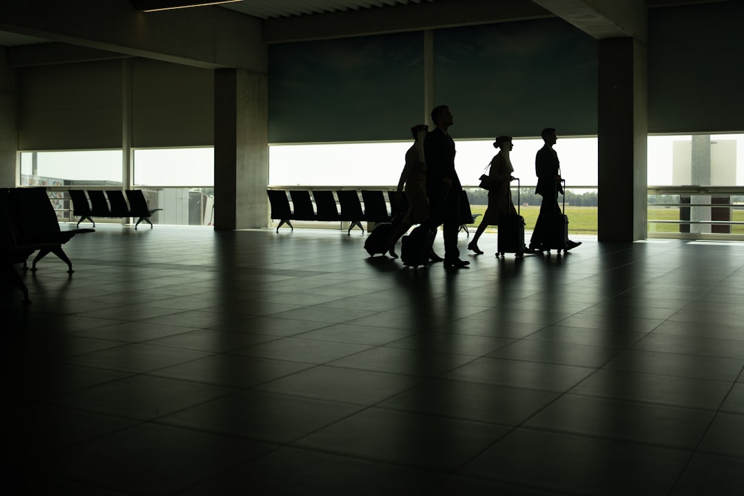 A family with luggage at anairport terminal in Japan, where the departure tax applies to every passenger aged two and over.
