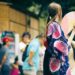 japanese-woman-folding-fan-summer-unsplash - TOKYOwebzine A woman in Tokyo uses a traditional folding fan to stay cool on a hot summer day, a simple ritual that works beautifully.