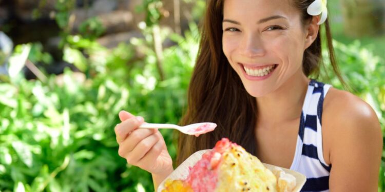 map_of_spain_with_morocco_and_france-1 - TOKYOwebzine A woman savors a bowl of kakigori at aTokyo shop, holding a small spoon over a mountain of shaved ice with fresh fruit syrup.