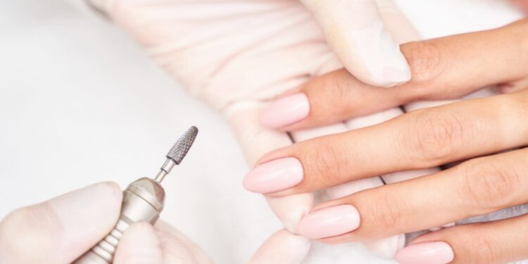 map_of_spain_with_morocco_and_france__1_ - TOKYOwebzine A woman admiring her finished Tokyo nail art at a bright, minimalist Japanese nail studio