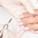 map_of_spain_with_morocco_and_france__1_ - TOKYOwebzine A woman admiring her finished Tokyo nail art at a bright, minimalist Japanese nail studio