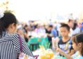recycling__1_ - TOKYOwebzine A woman enjoys authentic cuisine at one of the international food festivals held in Tokyo's parks in June.