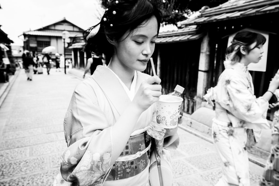 A woman in Tokyo drinks cold mugicha barley tea, a traditional habit that helps residents stay cool through thesummer months.