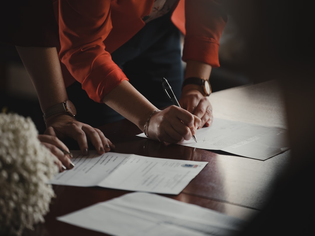 A benrishi attorney reviewing a Japan trademark application file on behalf of a foreign client