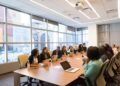 entrepreneur-in-office-meeting-unsplash - TOKYOwebzine A foreign founder and Japanese business partner reviewing plans in a Tokyo startup office
