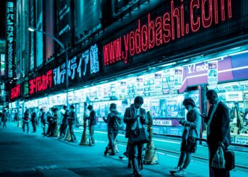 Traders monitor Tokyo stocks during a sharp tech selloff driven by AI profitability fears