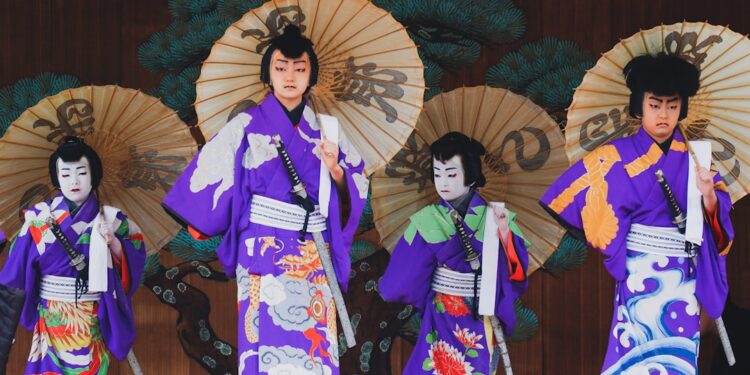 yukata-fireworks-unsplash - TOKYOwebzine A woman in yukata watching hanabi spots light up the Tokyo riverbank on a summer night