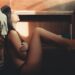 a-woman-in-room-unsplash - TOKYOwebzine A woman in her minimalist Tokyo apartment, showing how thoughtful objects create a calm interior.