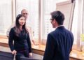 asian-businessman-meeting-unsplash - TOKYOwebzine A foreign founder shaking hands with a Tokyo angel investor after a successful first meeting in a modern office