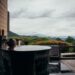 A woman resting in a private onsen suite, reflecting the serene standard of Tokyo wellness membership clubs