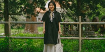 A woman wearing pieces from her capsule wardrobe made of natural-dye Japanese textiles