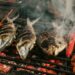Chef grilling fish during Tokyo's sanma season at an autumn festival
