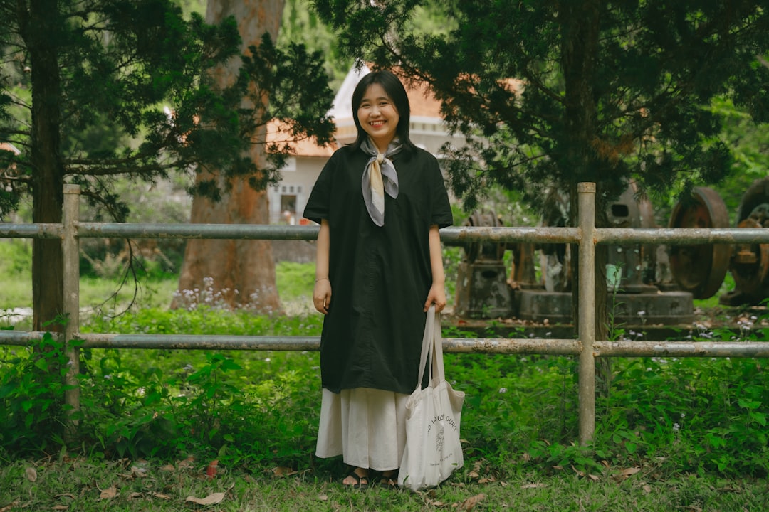 A woman wearing pieces from her capsule wardrobe made of natural-dye Japanese textiles
